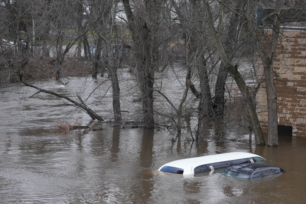 East Coast residents struggle with flooding and power outages after ...
