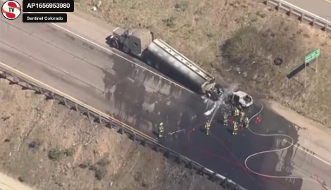 A fiery tanker crash and hazmat spill shuts down Interstate 70 near ...