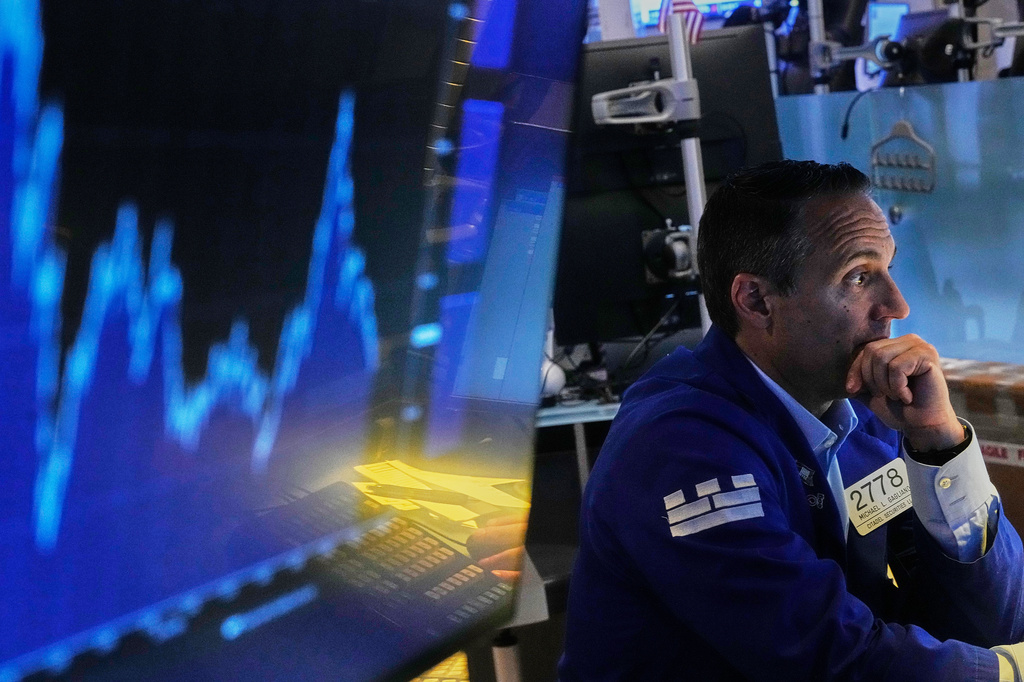 Brent oil tops $100; Tesla, Alphabet drag Wall Street lower