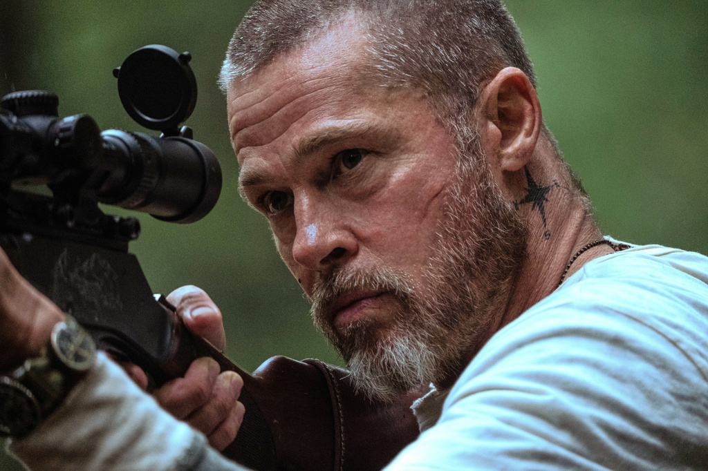 Movie Review: In ‘Heart of the Beast,’ Brad Pitt and a dog try to survive in the wild