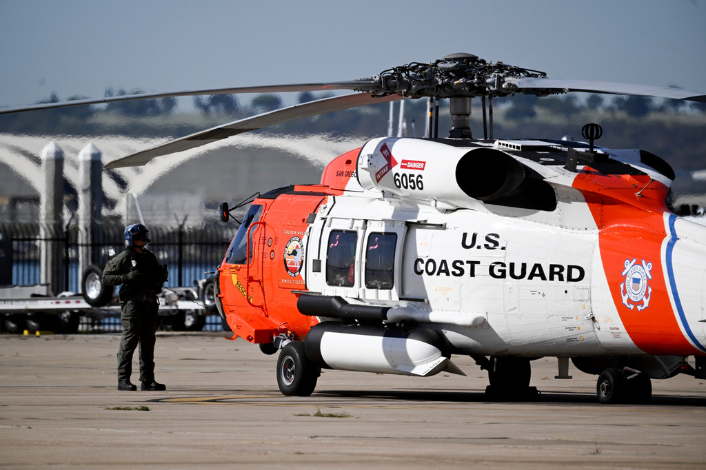 Search continues after boat capsizes off Baja California coast. Survivors attacked by sharks